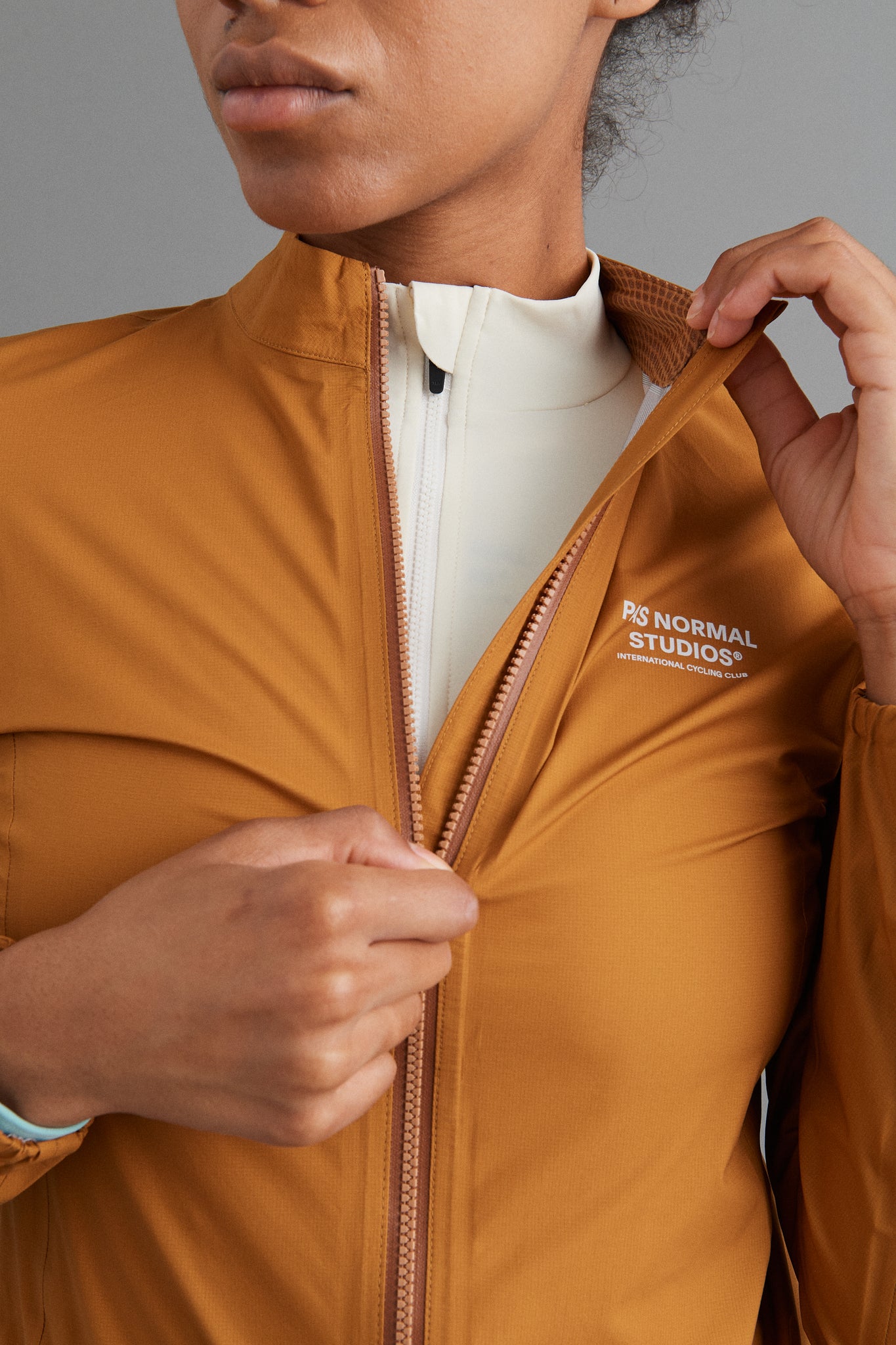 Women's Mechanism Rain Jacket - Burned Orange